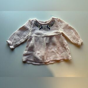 Soft Pink Ribbed Blouse with Flared Hem